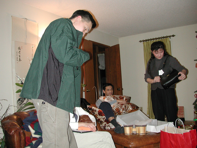 Opening Gifts: John, CJ, James, and Anne