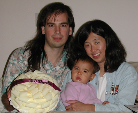 Mark, Maya, and Rebecca celebrate Maya's first birthday