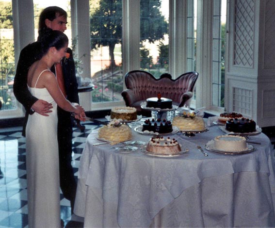 Mark and Rebecca cutting the cake